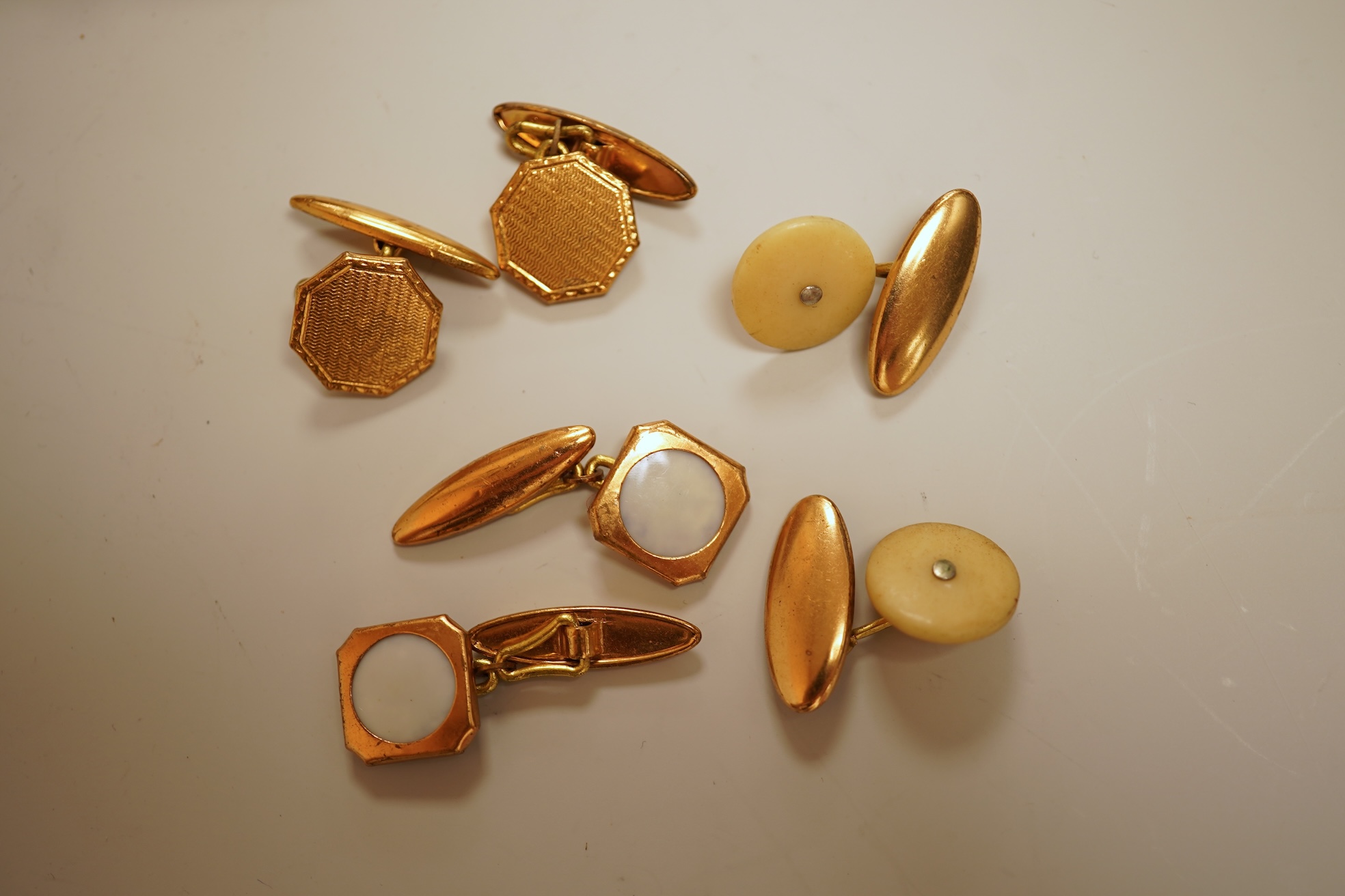 A small group of assorted jewellery including a gold plated curb link bracelet, silver brooch, simulated pearl necklace and costume.